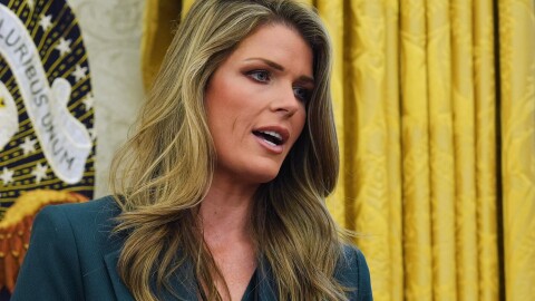 FILE - Lindsey Halligan speaks as President Donald Trump signs executive orders in the Oval Office of the White House, Friday, Jan. 31, 2025, in Washington.