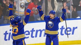 Buffalo Sabres defenseman Bowen Byram (4) celebrates his goal with defenseman Mattias Samuelsson (23) during a regular season game las month in Buffalo. The Sabres begin their first playoff series in 15 years Sunday evening when they host the Boston Bruins in the opening game of their first-round series.
