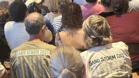 Democratic governor nominee Rob Sand spoke to more than 250 people in a Sioux City campaign stop, where some wore Sand Storm campaign shirts, on July 16, 2026. (Bret Hayworth, Siouxland Public Media News)