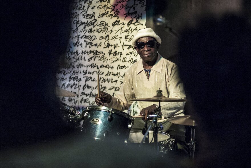 In this photo taken Saturday, April 8, 2017, pioneering African drummer Tony Allen, whose influential career spanned decades and continents, plays in concert with Senegalese musician Cheikh Lo in Dakar, Senegal. Tony Allen, the driver of the Afrobeat sound who formed a partnership with guitarist and composer Fela Kuti, died of aortic failure at the Pompidou Hospital in Paris aged 79 on April 30, 2020.