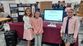 Model Laboratory School students Emma Lingenfelter, Ayla Slijepcevic, Amelia Reljac competed in last week’s Student Technology Leadership Program at Rupp Arena