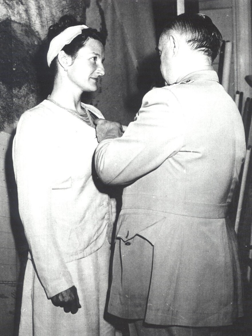 William Donovan, head of the Office of Strategic Services, presents Virginia Hall with the Distinguished Service Cross in 1945. She was the only civilian woman so honored in World War II. President Harry Truman proposed a public ceremony at the White House, but Hall declined because she wanted to stay undercover. The event with Donovan was private. The only outsider attending was Hall's mother.