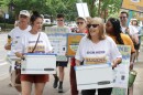 Eugene Clean Energy Fund supporters march through downtown Eugene.