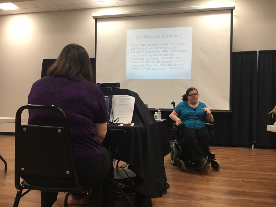 Emily Ladau, a disability rights activist, speaking at the JCC in Rochester about an idea called self-direction.