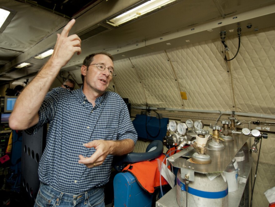 James Crawford, principal investigator of the DISCOVER-AQ project, aboard the P-3B at Baltimore/Washington International Airport on June 28, 2011. The aircraft is part of a month-long field campaign designed to improve satellite measurements of air pollution.