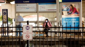 Passengers wait for the light rail train on Tuesday, Jan. 18, 2022, at St. Louis' MetroLink’s Grand Station. 