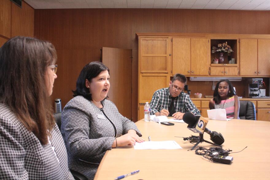 Interim Superintendent Aurora Lora talks with reporters Tuesday about the latest cuts to Oklahoma City Public Schools.