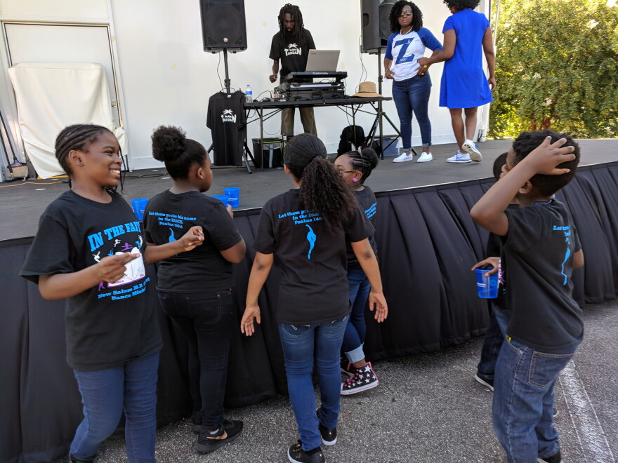 Talented young residents of the Providence Neighborhood prepare to strut their stuff on Saturday.