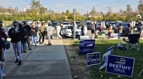 Voters line up outside of the MSD Lawrence Education & Community Center at lunchtime on Oct. 30, 2024.