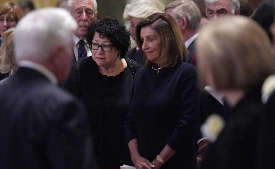 Supreme Court Justice Sonia Sotomayor, left and House Speaker Nancy Pelosi arrive for the funeral mass.