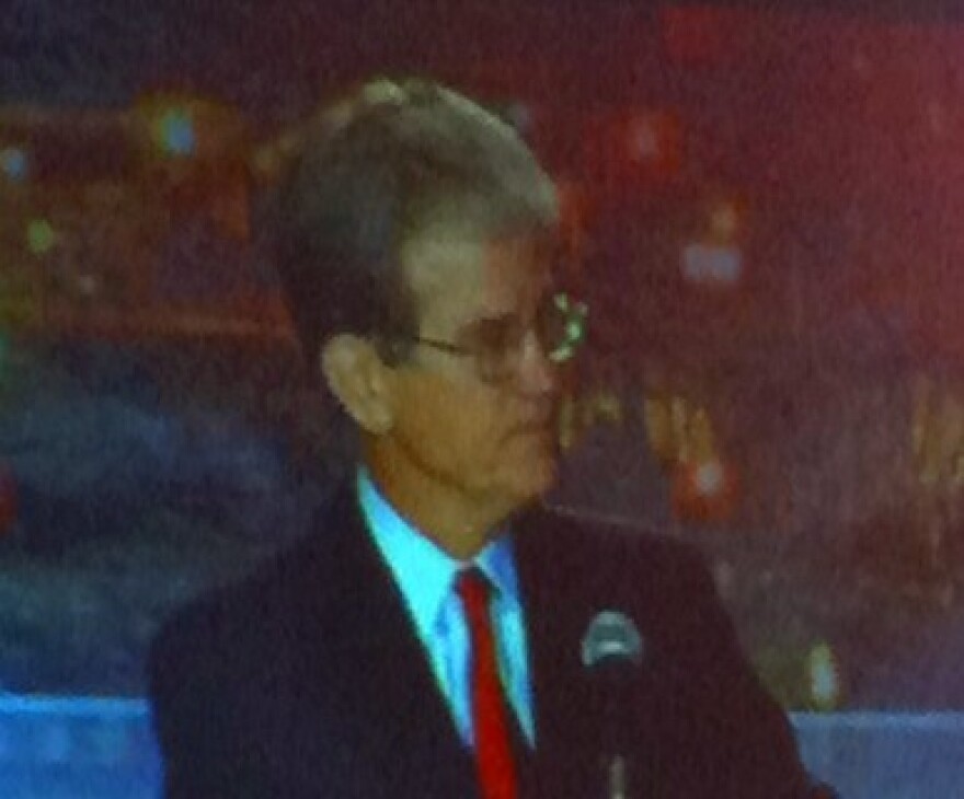 Tom Coburn speaking at a Tulsa Chamber event.