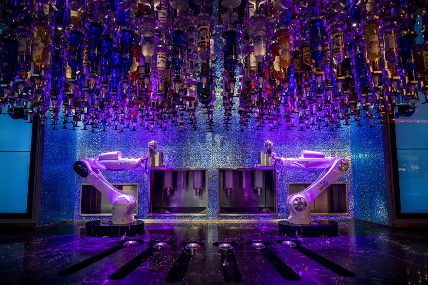 Robotic arms wait to make drinks at The Tipsy Robot in Las Vegas.