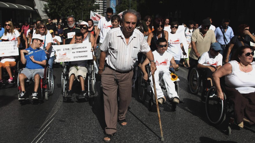 People with disabilities take part in a march against the government's new austerity measures in central Athens on Thursday.