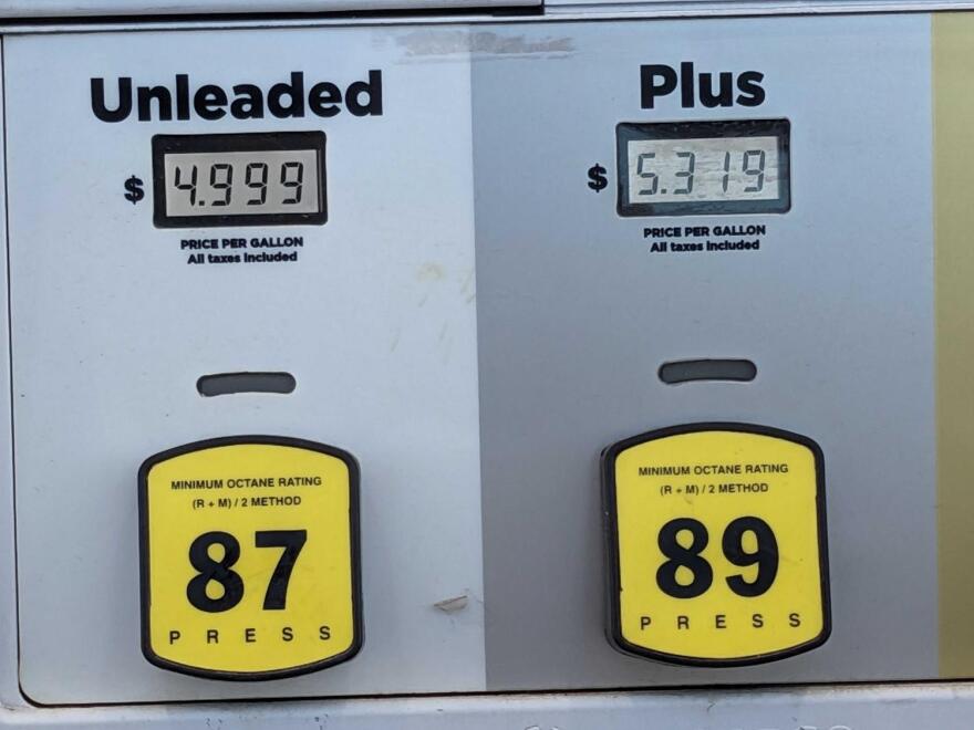 Unleaded gas price read-out of $4.99