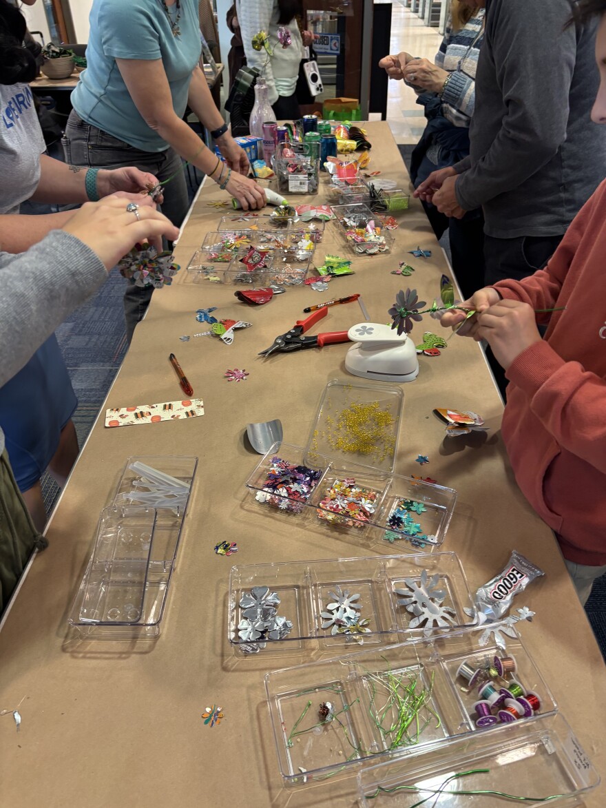 One of the trash-to-artwork stations at the UpCycle Festival in Norfolk on Saturday, Nov. 15, 2025.