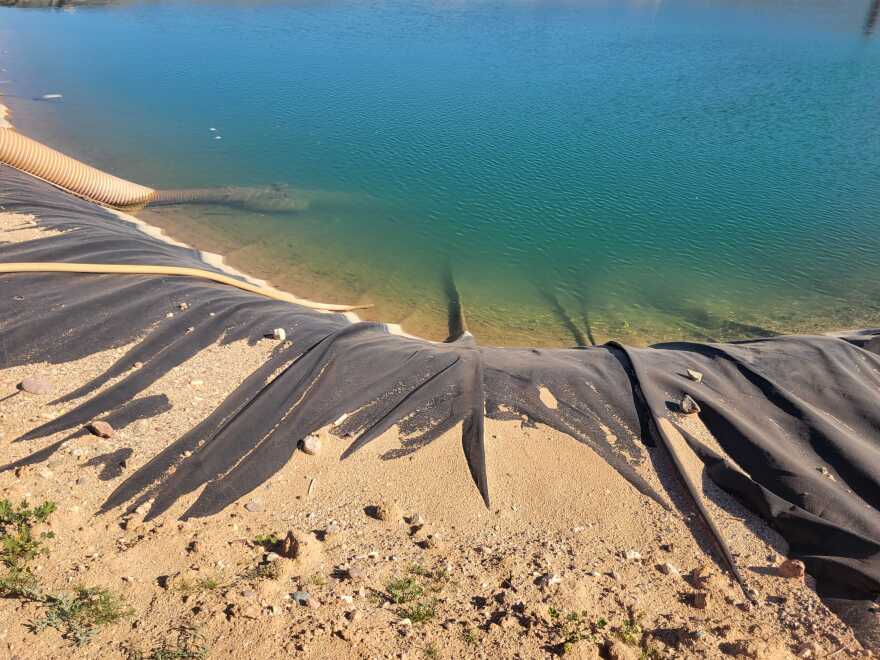 Water in tarp with dirt