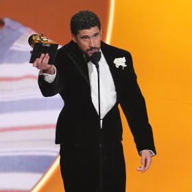 Bad Bunny accepts the award for album of the year for "Debí Tirar Más Fotos" during the 68th annual Grammy Awards on Sunday, Feb. 1, 2026, in Los Angeles. (AP Photo/Chris Pizzello)