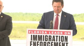 Gov. DeSantis and U.S. Border Czar Tom Homan, left, at the Everglades detention center in eastern Collier County Thursday.