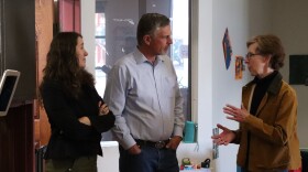 SFCC President Becky Rowley (right) speaks to U.S. Senator Martin Heinrich (D-NM) (center) and Early Childhood Center of Excellence Executive Director Catron Allred (left) during a tour of SFCC's Kids Campus