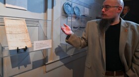 Luzerne County Historical Society Director of Operations and Programs Mark Riccetti Jr. discusses some of his favorite pieces in the society's "Celebrating the Semi-Quincentennial 250 Years of History" exhibition.