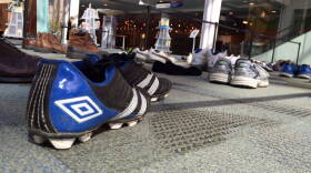 135 pairs of shoes at the Central Library represent Indy's 135 victims of criminal homicide in 2014.