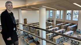Library Director Dana Conners gives a tour of the new downtown library branch. She says this view from the stairs is her favorite.