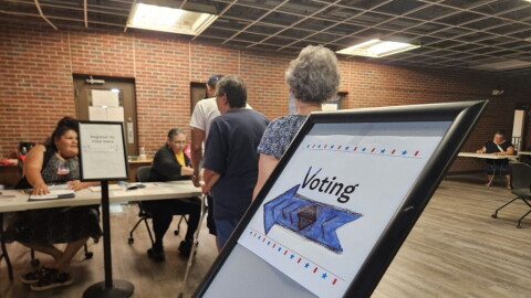 Voters wait their turns to cast their ballots Tuesday, Aug. 13, 2024, for the primary election at the Red Lake polling site at the Red Lake Humanities Center.