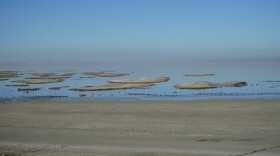 Gov. Spencer Cox presented his budget at Antelope Island in December. The declining lake levels are especially evident there.