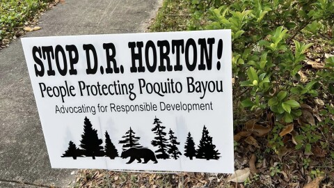 A sign in the Poquito Bayou neighborhood advocating to stop a high-density housing development.