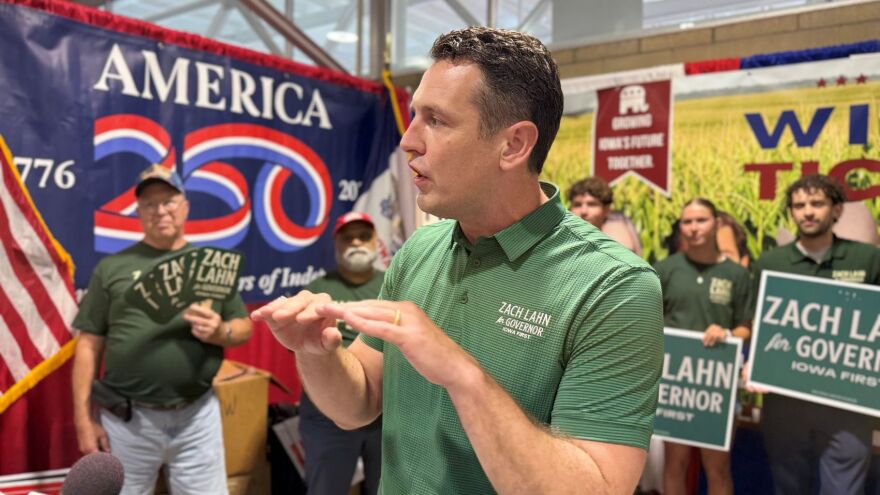 Republican governor nominee Zach Lahn speaks at the Iowa State Fair. (Sheila Brummer, IPR)