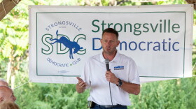 FILE - Brian Poindexter, Democratic nominee for Ohio's 7th congressional district, speaks at the Strongsville Democratic Club meeting, Aug. 5, 2026, in Strongsville, Ohio.