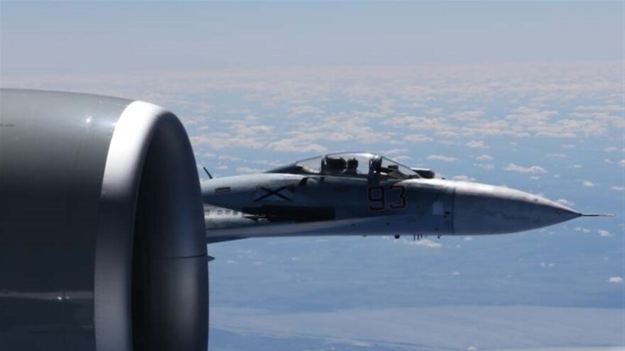 Dramatic photo of a Russian Su-27 jet coming within a few feet of a U.S. Air Force reconnaissance jet over the Baltic Sea in June of last year, in a maneuver that has been criticized as unsafe.
