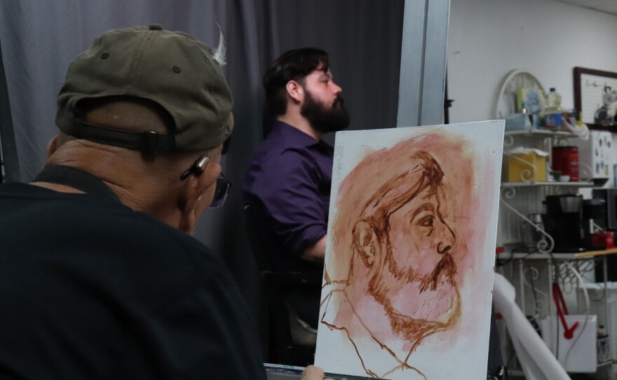 Jess Barrera (left) studies Derek Galvan during a June 24 portrait session at the Art Center of Corpus Christi. The sessions are held Wednesdays from 10 a.m. to 1 p.m.