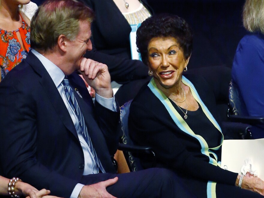 NFL Commissioner, Roger Goodell, talks with Cherry Starr, wife of Bart Starr, during a memorial service for former Alabama and Green Bay Packer quarterback, Bart Starr, Sunday, June 9, 2019, in Homewood, Ala. (AP Photo/Butch Dill)