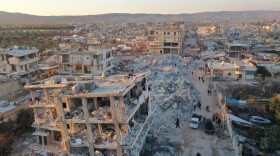 An aerial view shows the destroyed buildings in the rebel-held town of Jindayris, Syria, on Feb. 9, 2023, three days after a deadly earthquake that hit Turkey and Syria. (Omar Haj Kadour/AFP via Getty Images)