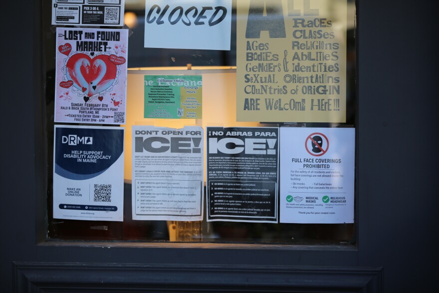 Signs on a Portland storefront on Wednesday, Jan. 28, 2026.