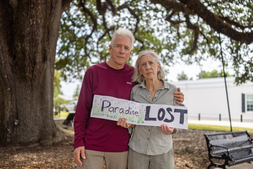 Kim Nehrbass and his wife, Libby Smith, stand outside the SpaceX announcement in Abbeville, Louisiana, on Tuesday, August 25, 2026. 