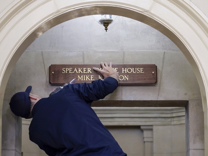 A new sign is installed above the entrance to the office of House Speaker Mike Johnson, R-La., on Wednesday, at the Capitol in Washington.