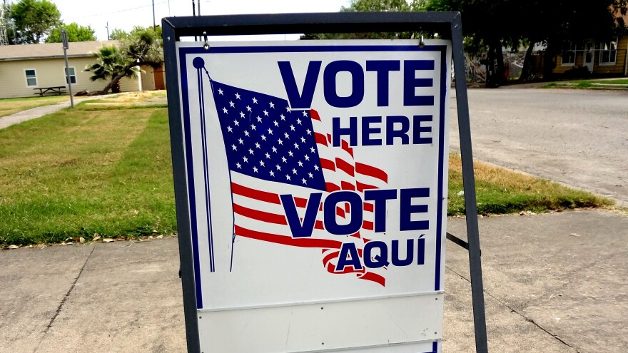 Vote here sign