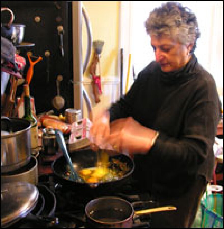 King cooks Parsi eggs in one of three kitchens in her San Francisco home.