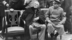 President Franklin D. Roosevelt, center, and Marshal Josef Stalin, right, at the Yalta Conference in Yalta, Crimea, on Feb. 16, 1945. (British Official Photo/AP)