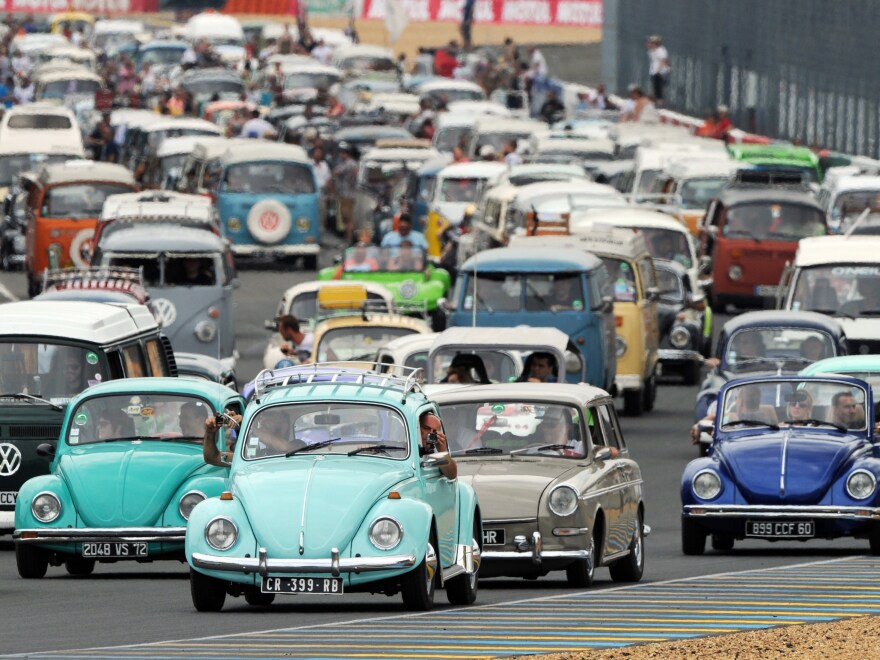 The Volkswagen Beetle will cease production on Wednesday at the company's factory in Puebla, Mexico. Here, vintage Beetles and other Volkswagen models at a VW festival in France in 2014.