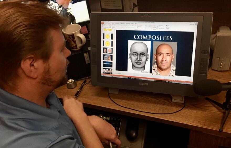 man looking at computer