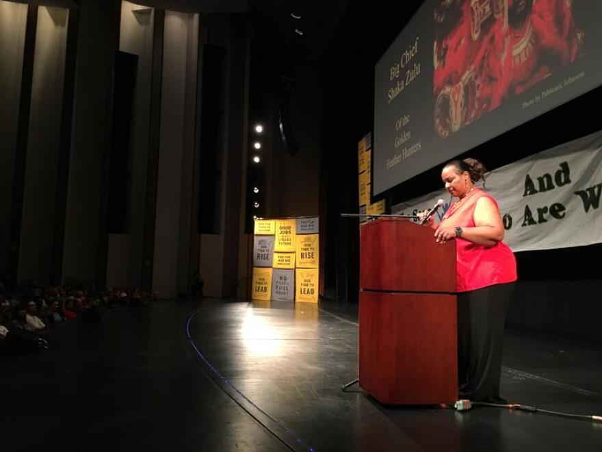 Colette Pichon Battle, executive director of the Gulf Coast Center for Law and Policy, addresses a crowd at the Mahalia Jackson Theater during the New Orleans stop of the national Green New Deal tour in May 2019.