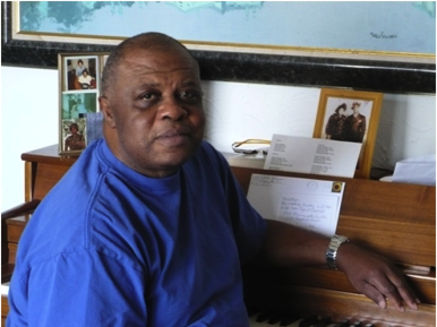 Wilmer McBride at his piano. Photo by Annie Walsh / KCUR.