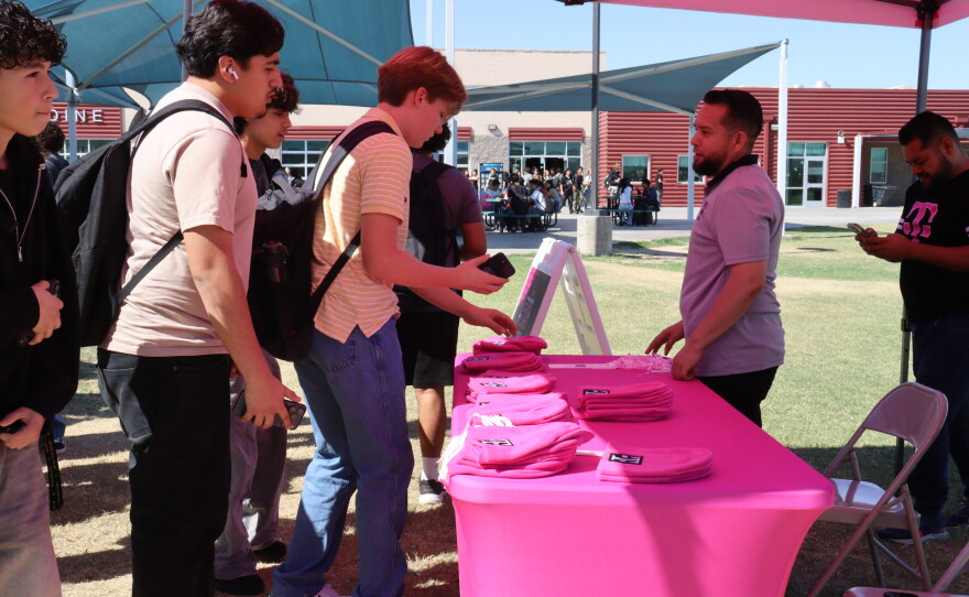 After voting for their school, students received T-Mobile swag.