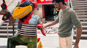 Daniyal Shahbaz, a native of Pakistan, stands next to the Iowa State University mascot inside the school’s Memorial Union building during fall freshman orientation in 2024.