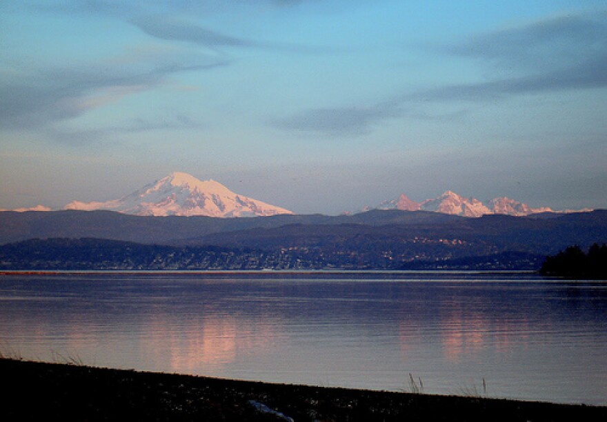 Bellingham Bay and Mt. Baker, as seen from Gooseberry Point, in Nov. 2008. Climate change is predicted to raise sea levels by as much as three feet by century's end. A new effort between Washington and British Columbia takes on climate change.