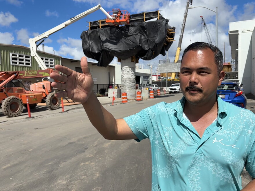 Tyler Dos Santos-Tam points out streets in the Iwilei neighborhood on Monday, Oct. 5, 2026 where the Skyline rail line is being built in Honolulu.