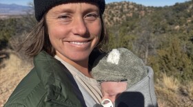 Amelia Dotzenrod walks with her son Alder outside of Santa Fe in early December.